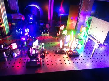 The new printer uses low-power continuous wave lasers to create holograms on a highly sensitive photomaterial developed by the researchers. Courtesy of Yves Gentet.