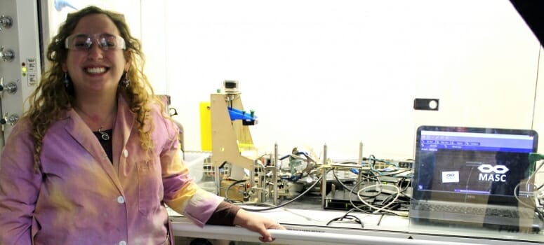 Graduate student Johanna Schwartz next to the multimaterial printing setup that she built. University of Wisconsin-Madison.