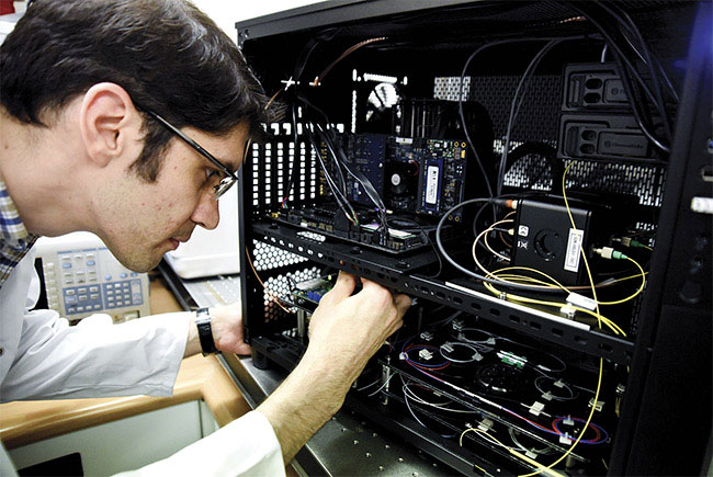 A distributed optical fiber acoustic sensing unit capable of measuring vibrations every 0.5 m along multiple kilometers of standard single-mode fiber. The strain sensitivity of this unit was measured to be 10 ne with maximum detectible strain of 1 me. Courtesy of Ali Masoudi/ University of Southampton, U.K.