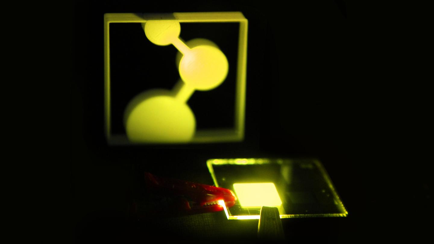 The first prototype of the OLED developed in Mainz, Germany, illuminates the MPI-P logo. Courtesy of MPI-P/License CC-by-SA.