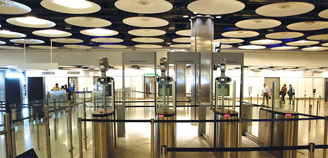 Figure 1. The automatic passport gates at Heathrow Airport’s terminal 5 use face recognition technology. Courtesy of Home Office under CC.