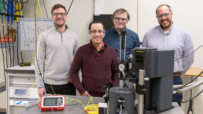 Argonne scientists, (l) to (r): Sean Sullivan, Gary Wolfowicz, Joseph Heremans, and Alan Dibos, worked on the quantum loop project and demonstrated the operation of the testbed by generating, transmitting, and detecting optical pulses through one and then both fiber loops. Courtesy of Argonne National Laboratory.