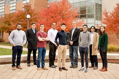 Illinois researchers, from left, Raman Kumar, Corey Richards, Alex Littlefield, Lynford Goddard, Haibo Gao, Paul Braun, Dajie Xie, Christian Ocier and Andrea Perry. Courtesy of University of Illinois News Bureau via L. Brian Stuaffer.