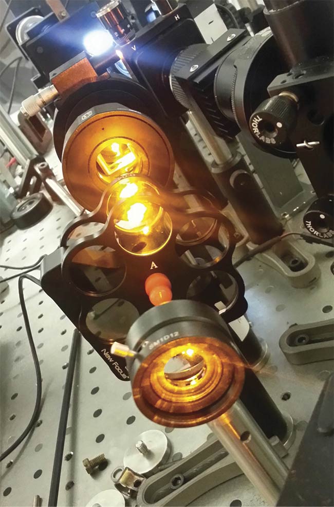 The Kimel group has devised optical elements that can shape the polarization of femtosecond laser pulses to achieve ultrafast magnetic recording with the help of light. Courtesy of A. Stupakiewicz. 