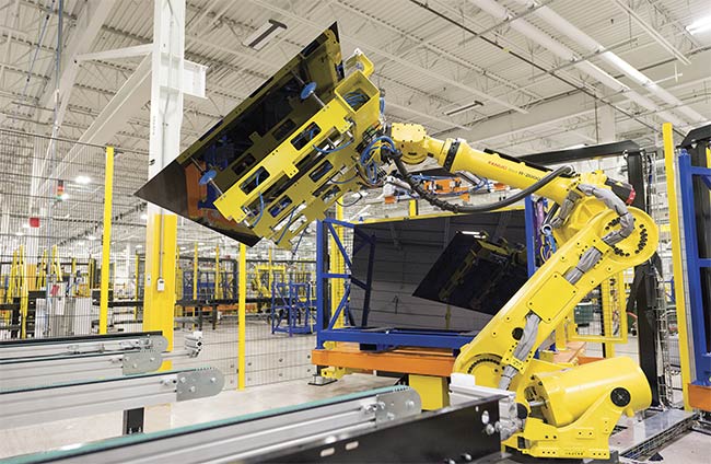 Advancements in materials and innovations in the manufacturing of photovoltaic panels, such as increasing automation, have cut the cost of solar power so that it is competitive with other electricity sources. Courtesy of First Solar Inc.