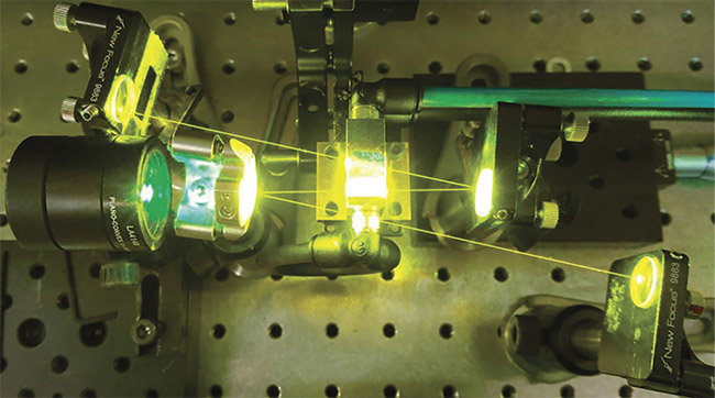 Monolithic diamond Raman crystals pumped by 532-nm light produce 573-nm output at the first-order Stokes shift. Pumped at 1064 nm, they emit at 1240 nm for first-order Stokes wavelengths. Courtesy of University of Strathclyde and Macquarie University.