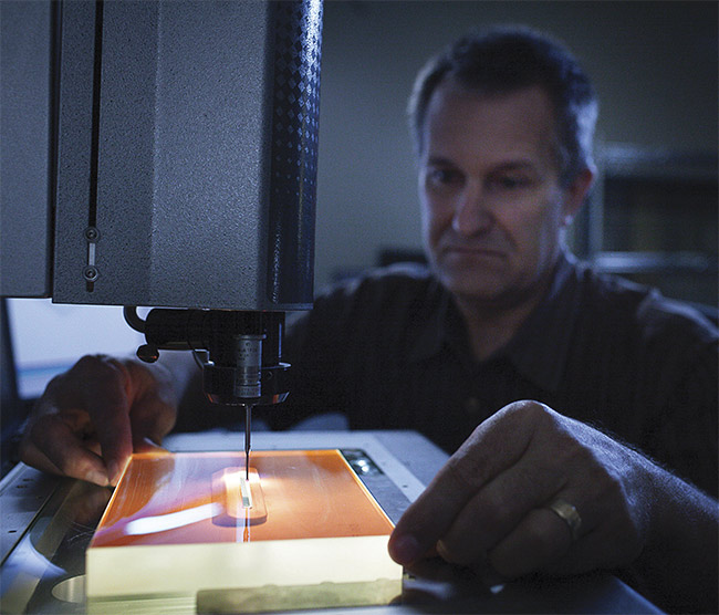 Dan Bukaty Jr., president of PG&O, uses the Starrett AV300 to measure a plano-optic product. Courtesy of PG&O.
