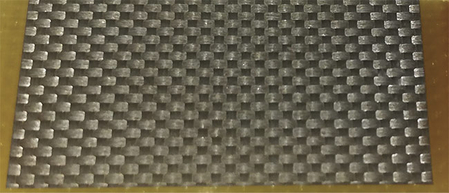 Figure 1. A laser micromachined glass-fiber-reinforced polymer (GFRP). Adapted from Reference 6. Courtesy of CC BY 4.0.