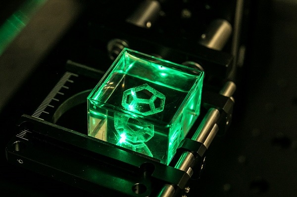 Researchers have developed a new laser-based process for 3D printing intricate parts made of glass. It uses multiphoton polymerization to create an object directly in a 3D volume. Courtesy of Laurent Gallais, The Fresnel Institute and Ecole Centrale Marseille.
