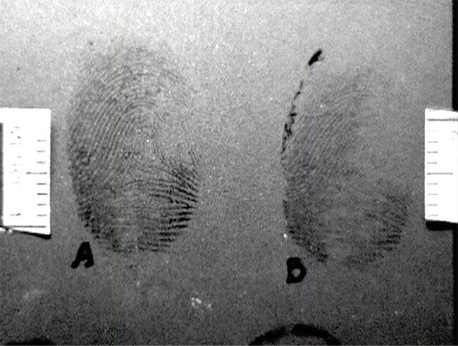Latent fingerprints appear faintly to cameras capturing visible light (top), but are much more evident at UV wavelengths (bottom), even without processing. Courtesy of Oculus Photonics.