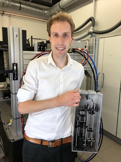 Nikolai Schröder with the prototype of the  in-line monitoring system. Courtesy of LAMpAS.