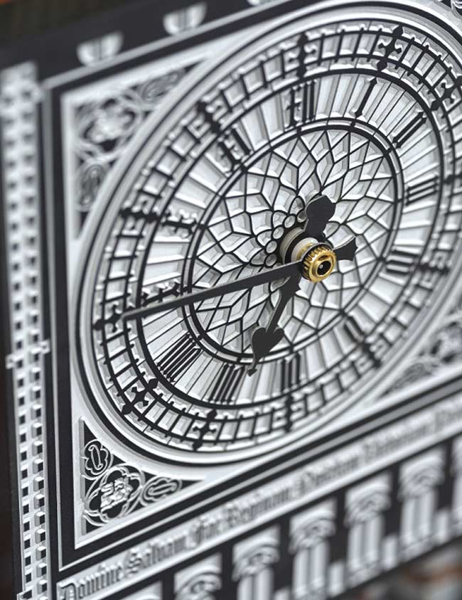 A clock face created with the help of a fiber laser marking system. The laser removed the black anodized layer of an aluminum sheet to engrave the intricate 3D relief pattern. Courtesy of TRUMPF.