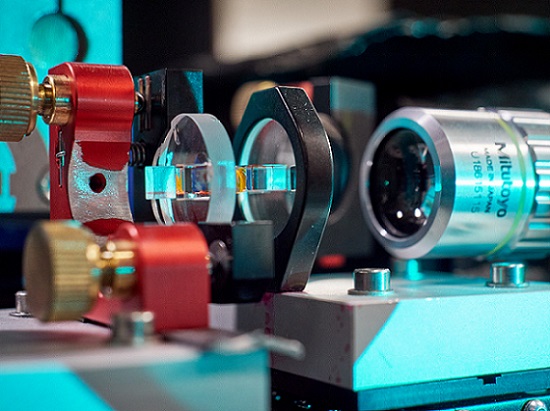 On the right is a microscope objective used to observe and analyze the light emerging from the resonator. Courtesy of Gregor Hübl, University of Bonn.