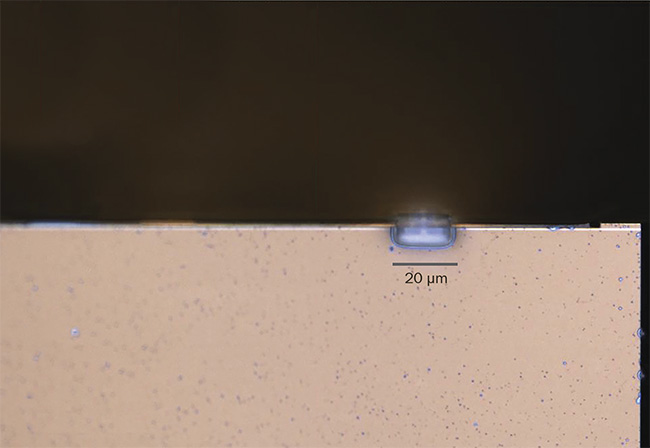 Figure 1. A microlens printed directly on the laser facet. On-device printing via two-photon polymerization allows for further miniaturization of components. Courtesy of Multiphoton Optics GmbH, in cooperation with nanoplus Nanosystems and Technologies GmbH.