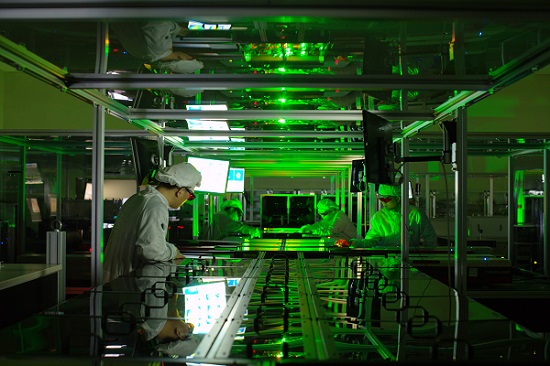 Researchers at the Centre for Relativistic Laser Science work on the CoReLS 4-PW laser, which recently achieved a record intensity of 10^23 W/cm2. Courtesy of Chang Hee Nam, CoReLS.