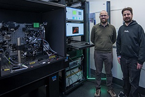 Researchers Niall Geoghegan (l) and Lachlan Whitehead (r) with the lattice light-sheet microscope. Courtesy of WEHI.