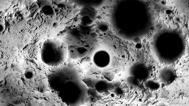 An illumination map of the lunar south pole. The shades of gray depict the amount of sunlight that will be received in 2024, the year scheduled for a crewed landing. The floors of many craters are permanently in shadow, while some higher elevations are constantly illuminated by the sun. Orbital measurements indicate that water or water ice may be present at the lunar south pole, which is one reason that both crewed and robotic landings are scheduled to visit the region over the next few years. Courtesy of NASA.