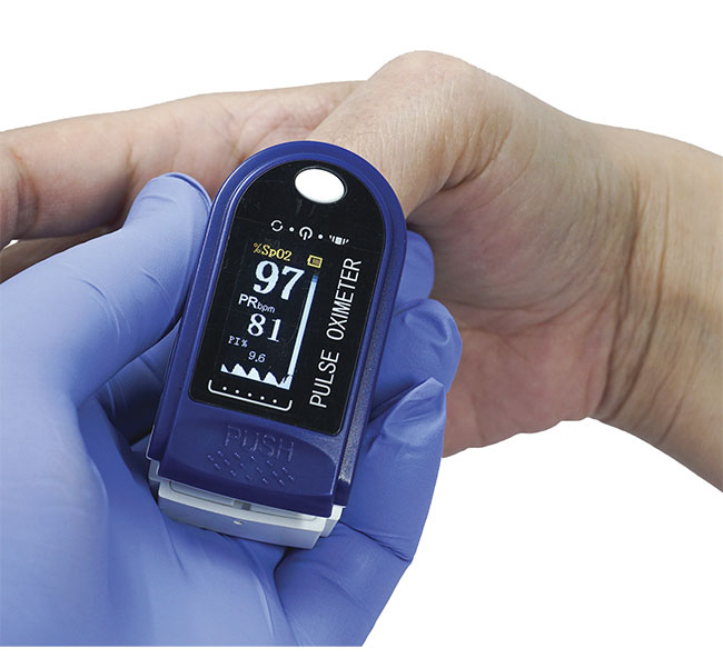 Figure 4. A portable oximeter is used to measure oxygen levels and pulse rate. Portable, low-cost life science devices particularly benefit from incorporating color glass filters. Courtesy of Edmund Optics.