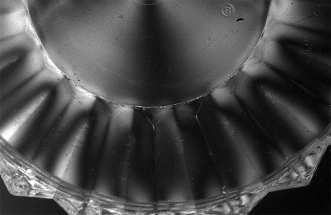 Changes in polarization indicate areas of differing stress in plastic. Courtesy of Optical Metrology Solutions.