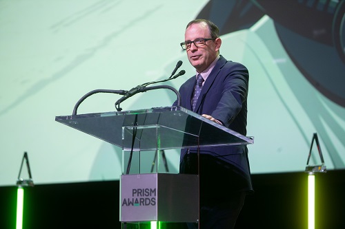 Editor of Photonics Spectra magazine Daniel McCarthy addresses the crowd at the 2022 Prism Awards ceremony Jan. 26 in San Francisco. Winners in 10 categories were recognized with Prism Awards as the event returned to Photonics West. Courtesy of SPIE.