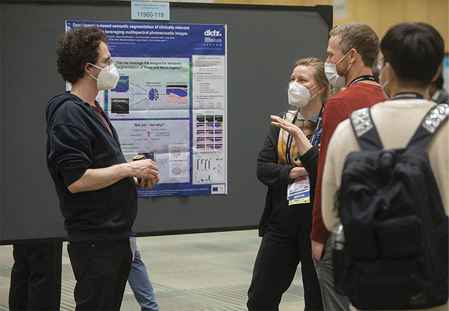 Student researchers gather to discuss their work during a poster session at last year’s BiOS Expo. Courtesy of SPIE.