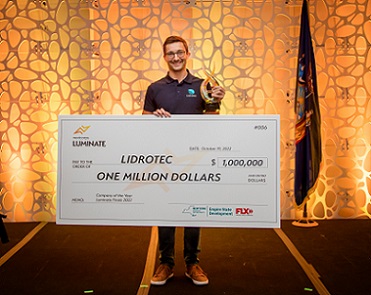 Bochum, Germany-based Lidrotec received the "Company of the Year" award at Luminate Finals 2022, which was held live during Optica's Frontiers in Optics + Laser Science conference in Rochester. The company will receive $1 million in investment from New York State through the Finger Lakes Forward Upstate Revitalization Initiative. Company CEO Alexander Igelmann accepted the company's award. Courtesy of Sue Zuecola.