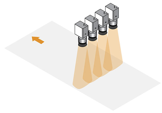 Figure 1. An AOI scanning system. Several static cameras arranged in a row scan a single panel in parallel. The scanned panel moves simultaneously with image acquisitions to cover the entire panel’s surface. Courtesy of David Harel and Doron Nakar.