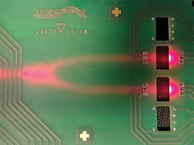 Cavities in an electro-optical circuit board (top) can provide access to the optical layer for in-plane or vertical coupling to transceivers. Splitters and/or combiners (bottom) can be integrated into the photonic circuits for multiplexing and parallel signal transmission. Courtesy of vario-optics AG.