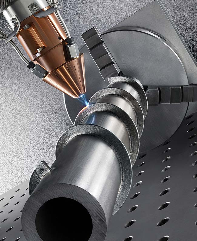 A 4-kW IR laser used for directed energy deposition builds features made of INCONEL 718, a high-strength nickel-based superalloy, on an extension auger. Courtesy of TRUMPF.