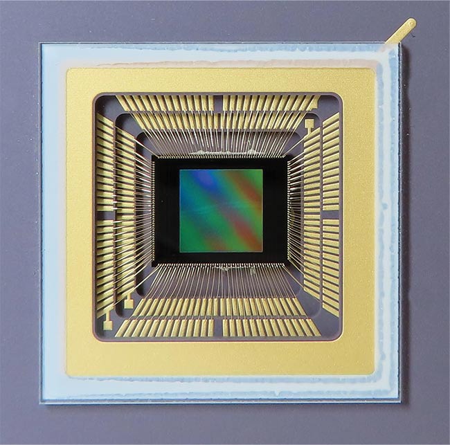 Figure 1. A quanta image sensor (QIS)-based camera capable of photon number resolving at full speed with a high spatial resolution (top). A QIS sensor chip designed and fabricated in a commercial CMOS image sensor process (bottom). Courtesy of Gigajot Technology.