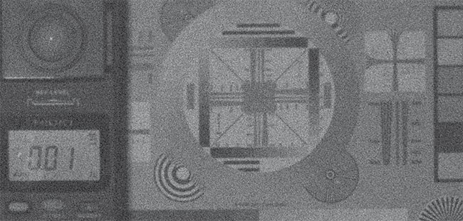 Figure 2. A low-light imaging comparison of an image captured using Gigajot’s GJ01611 QIS detector with 16.7-MP resolution and 1.1-µm pixel size (top) and an image captured using a state-of-the-art CMOS image sensor with 6.4-MP resolution and 2.4-µm pixel size (bottom). Images were captured under 10-mLux illumination with 40-msec exposure time through an f/1.4 lens. Both images show raw data without image enhancement. Though the QIS detector’s pixels are 4.8× smaller, its photon-counting read noise still delivers improved low-light imaging performance compared to the CMOS sensor. Courtesy of Gigajot Technology.