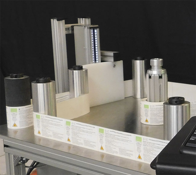  A label inspection system with a contact image line-scan sensor — an integrated and compact solution that works best when space is tight and inspection surfaces are flat. Courtesy of Artemis Vision.