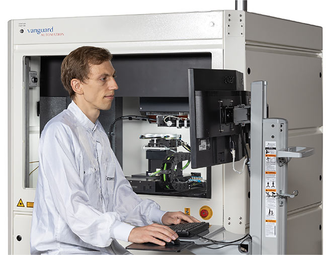 Figure 6. Industrial solutions for in situ printing of photonic wire bonds aim to shorten innovation cycles of photonic integrated circuits and to serve industrial production lines (right). Courtesy of Vanguard Automation.