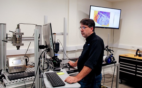 John Cabrer, Senior Systems Engineer, conducting a feasibility study in the MoviTHERM NDT lab. Courtesy of MoviTHERM. 