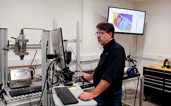 John Cabrer, Senior Systems Engineer, conducting a feasibility study in the MoviTHERM NDT lab. Courtesy of MoviTHERM.