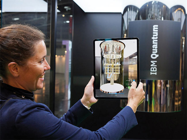 IBM’s exhibit at LASER World of PHOTONICS’ World of QUANTUM in Munich in April used augmented reality and a model of IBM’s quantum computer to demonstrate how its computing chip uses photons to perform operations (left). Quantum workforce recruitment was a prominent theme at QUANTUM, which also featured a Qiskit hackathon — co-organized by IBM Quantum and the German Federal Ministry of Education and Research — to challenge students to practice their quantum computing skills and compete against each other. Courtesy of Messe München.  ColdQuanta’s miniMOT is a compact magneto-optical trap for creating and trapping cold atoms (bottom). The device offers a simpler alternative to the expensive infrastructure and specialized skill sets normally required to create magneto-optical traps, and it enables quantum experimentation and education at the undergraduate level and beyond. Courtesy of ColdQuanta.