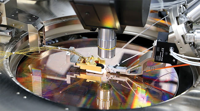 A silicon wafer incorporating thousands of quantum devices exemplifies the arrival of the so-called Quantum 2.0 era, in which engineers and manufacturers are teaming with physicists to convert fundamental quantum science into valuable, manufacturable, and scalable solutions. Courtesy of PsiQuantum.
