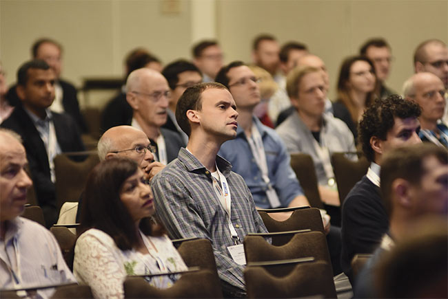 Audience members listen to a scientific program session at a past SciX conference. Courtesy of FACSS.