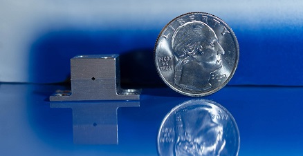 A quantum cascade laser smaller than a quarter, and with low power consumpion, fits in a 1U CubeSat, bout the size of a teapot, along with the spectrometer hardware, processor, and power supply. The technology is poised to aid in the detection of water on the moon and also to distinguish between water and water-like compounds. Courtesy of NASA/Michael Giunto.