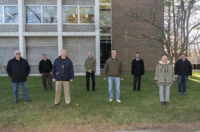 Members of the research team (l to r): Igor Pogorelsky (Accelerator Test Facility, ATF), Mark Palmer (ATF), James Wishart (Chemistry Division), Marcus Babzien (ATF), Mikhail Polyanskiy (ATF), Navid Vafaei-Najafabadi (ATF and Stony Brook University), Furong Wang (Chemistry), and Luca Cultrera (Instrumentation Division). Not pictured: Rotem Kupfer (ATF) and Triveni Rao (Instrumentation). Courtesy of Brookhaven National Laboratory.
