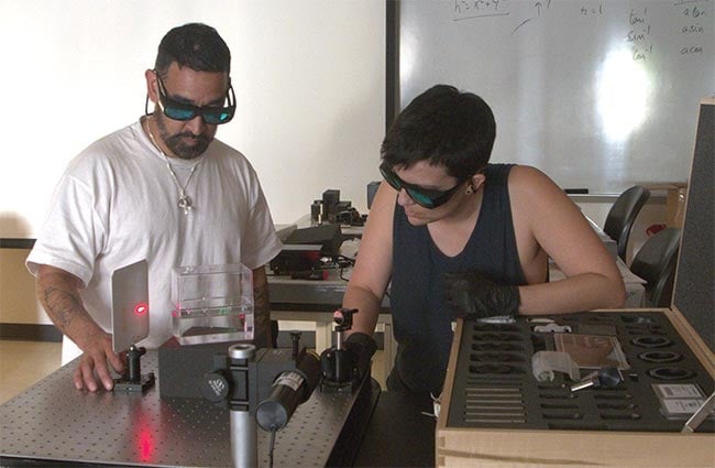 Students in the Photonics and Laser Technology certificate program at Cañada College work on a quantitative evaluation of the laws of geometrical optics. Courtesy of Cañada College