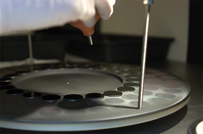 Production of coated lenses is now a refined, scalable process, making sensing technology more accessible than before. Courtesy of Umicore Coating Services.