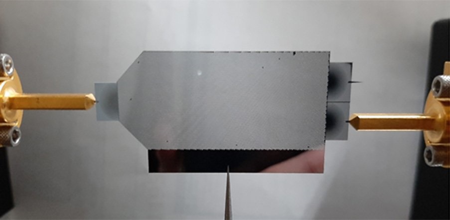 Photonic Crystals Imitate Gravitational Effects on Light