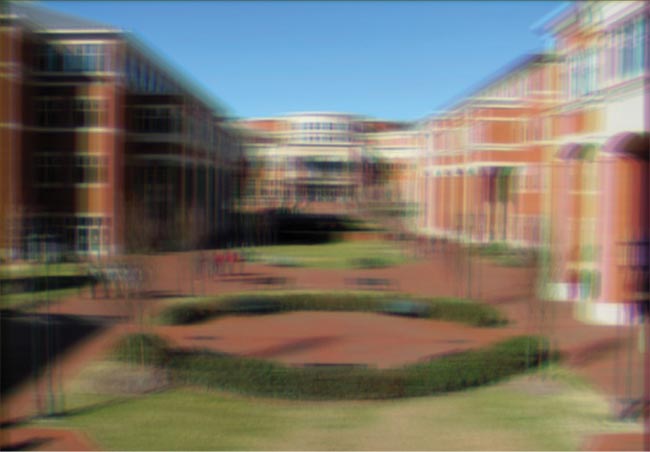 Figure 2. A simulation of mid-spatial frequency (MSF) errors on imaging. Top is a diffraction-limited image. The image on the bottom simulates the effects of MSF errors from a raster-milled surface with 150-nm peak-to-valley departure and 1-mm period. Courtesy of T. Suleski, CeFO, UNC Charlotte.