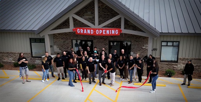 Members of the Midwest Optical Systems staff at the opening of the Delavan, Wis. manufacturing facility. Courtesy of Midwest Optical Systems.
