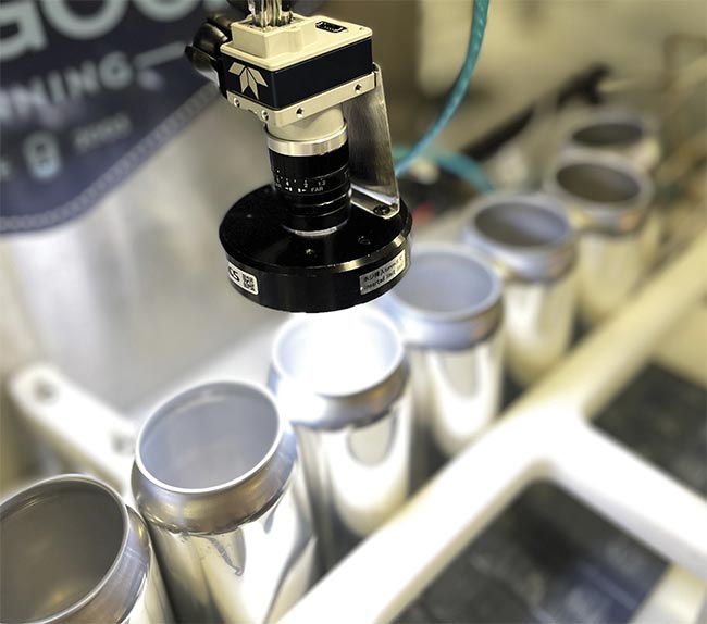 An inspection of aluminum cans on a production line using a Teledyne DALSA Genie Nano camera and ring light. Courtesy of Teledyne DALSA.