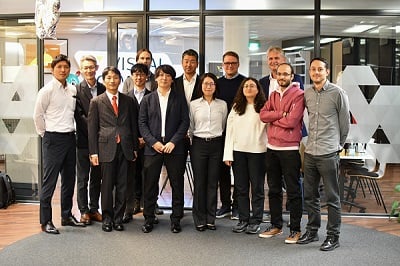 The ME Industrial Simulation Software Team, including members from both Visual Components and Mitsubishi Electric Corporation. Courtesy of Mitsubishi Electric.