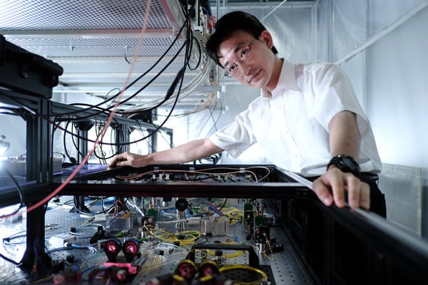 Atsushi Sakaguchi and his team are exploring the possibility of using light to produce quantum computers that are measurement based rather than gate based. Courtesy of RIKEN.