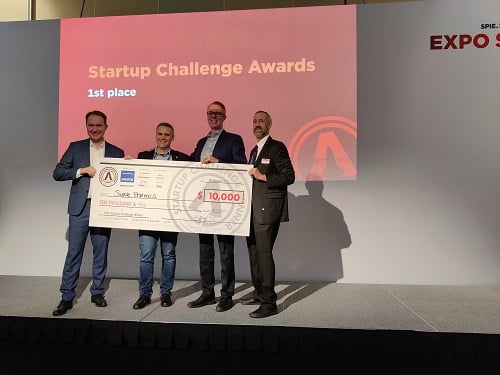 Swave Photonics, represented by company CEO Mike Noonen (second from right) earned the $10,000 top prize in the 2023 SPIE Startup Challenge.