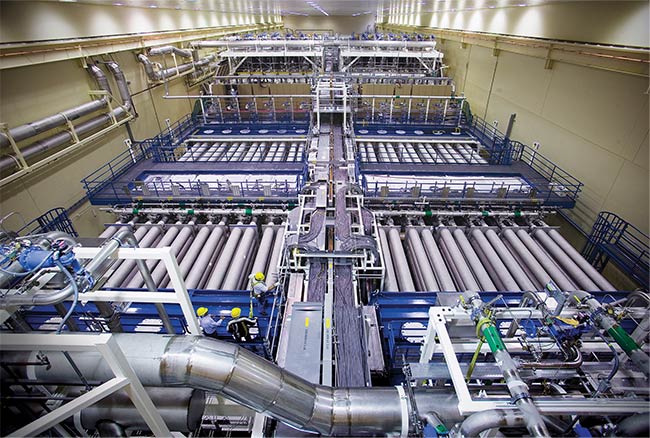 Seen from above, each of the National Ignition Facility’s two identical laser bays has two clusters of 48 beamlines, one on either side of the utility spine running down the middle of the bay. Courtesy of National Ignition Facility.
